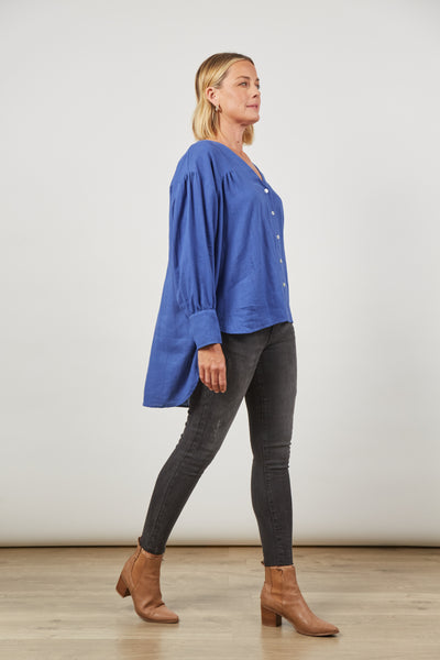 Women's ladies Azure blue Panorama shirt by Isle of Mine side view. high straight hem, low back hem. long sleeves with button cuff