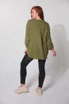 back of the relaxed sky blouse from haven in fern green
