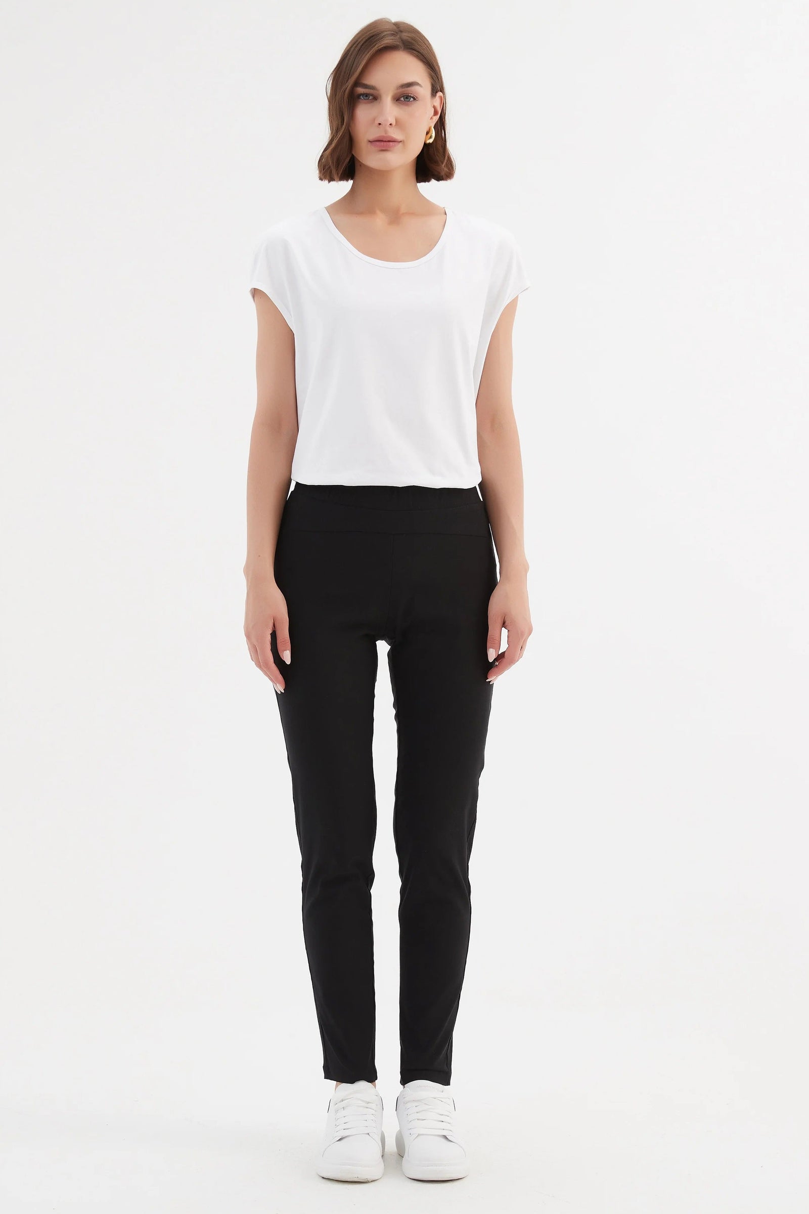 Women's straight leg black pants by Tirelli.