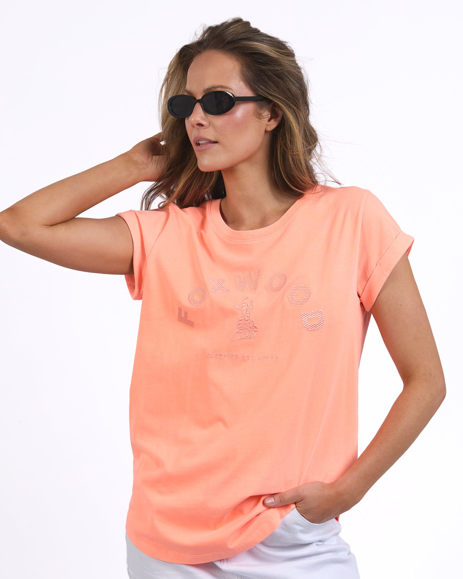 Foxwood's Signature Short Sleeve Tee in Neon Peach Orange.