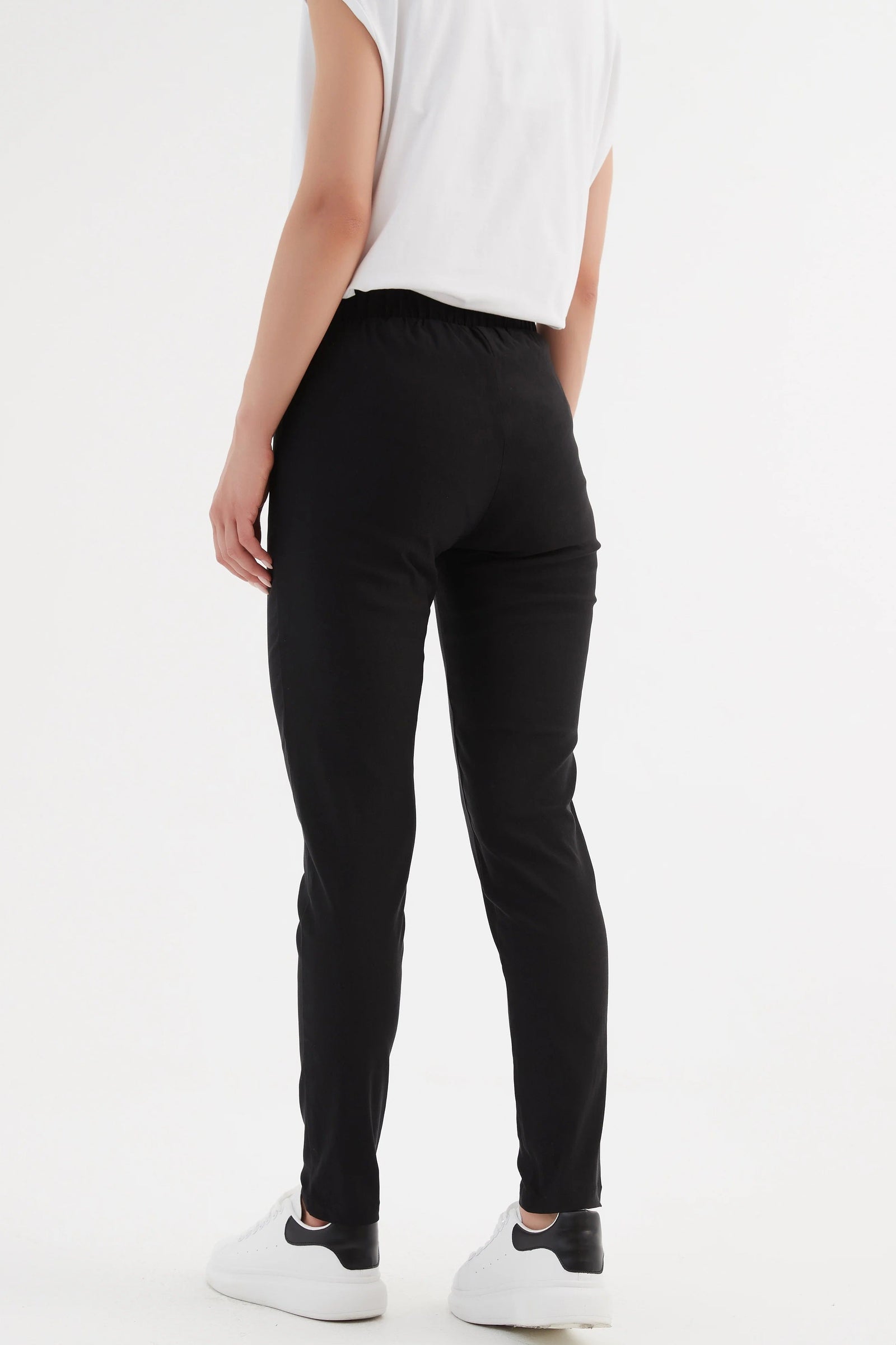 Ladies fitted straight leg trousers in black by Tirelli.