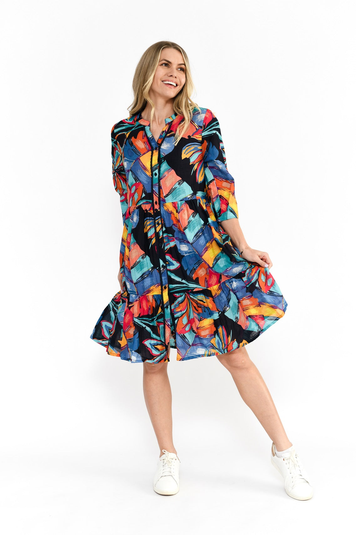 Woman wearing the Vivian multi coloured midi button up dress with a v-neck grandpa collar and knee length by One Summer.