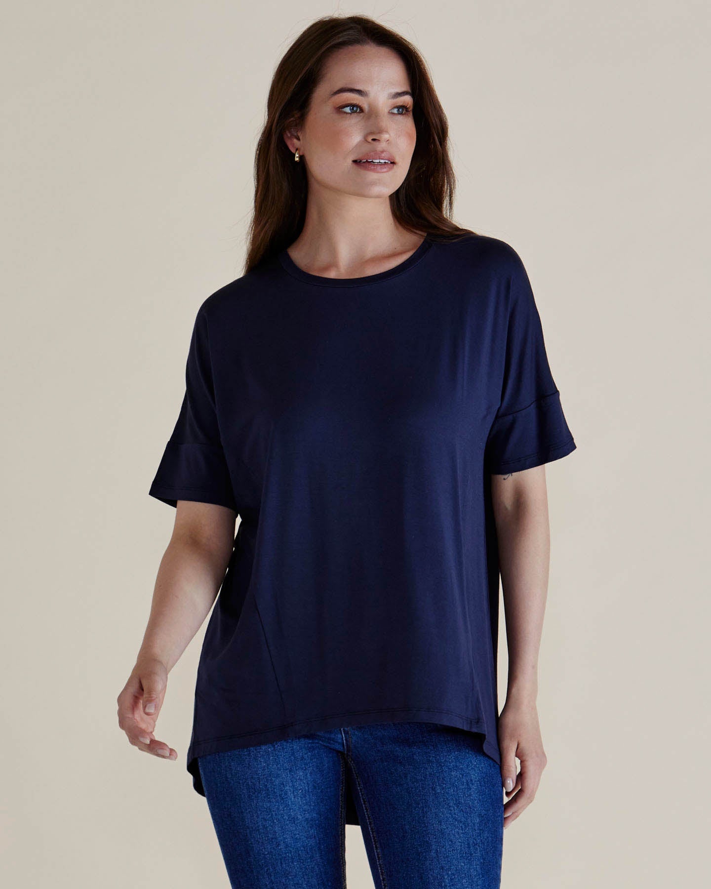 Lady wearing Betty Basics Romona Relaxed Bamboo Short sleeved tshirt in  Navy blue.