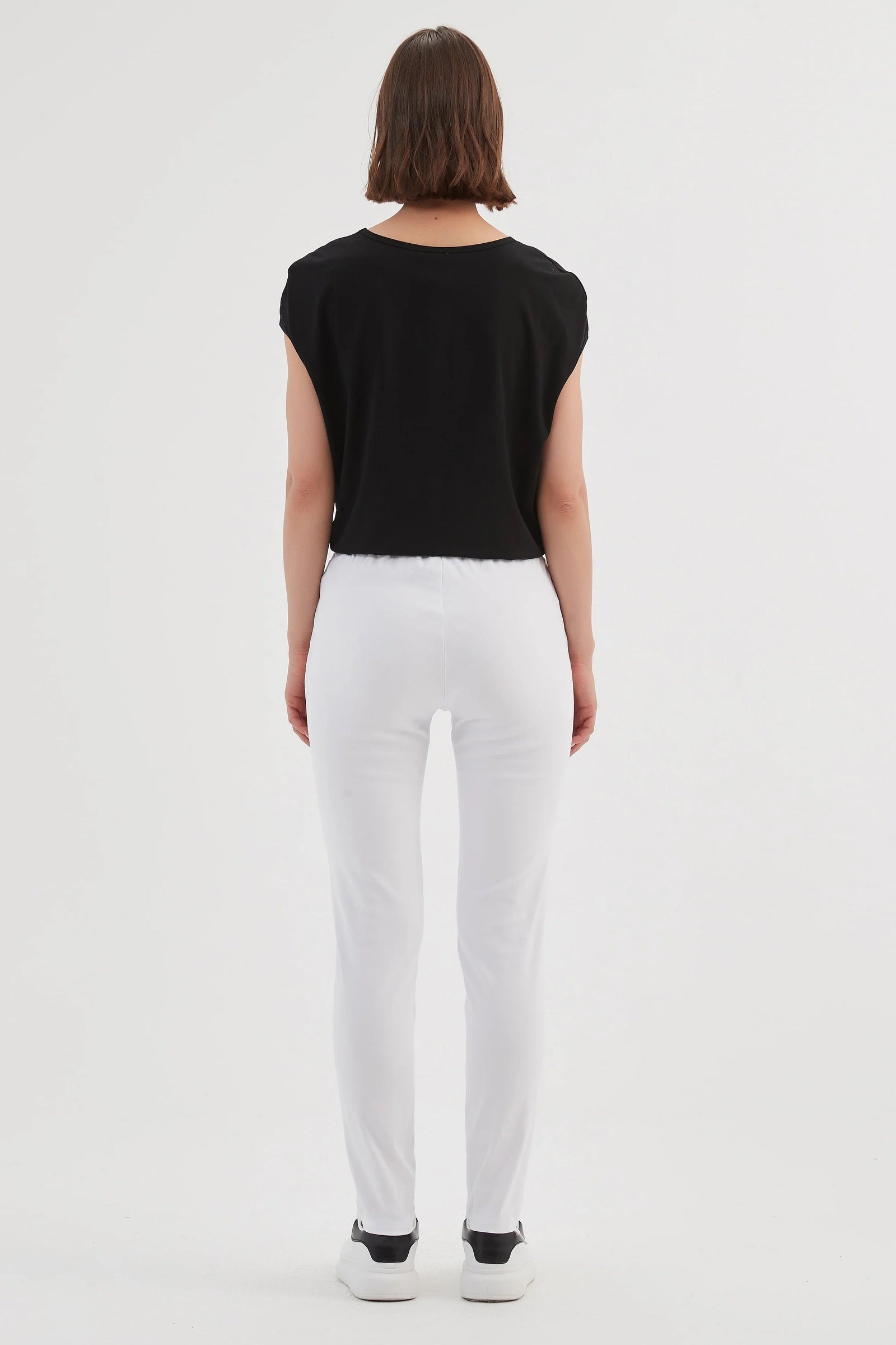 White ladies trousers in straight leg by Tirelli.
