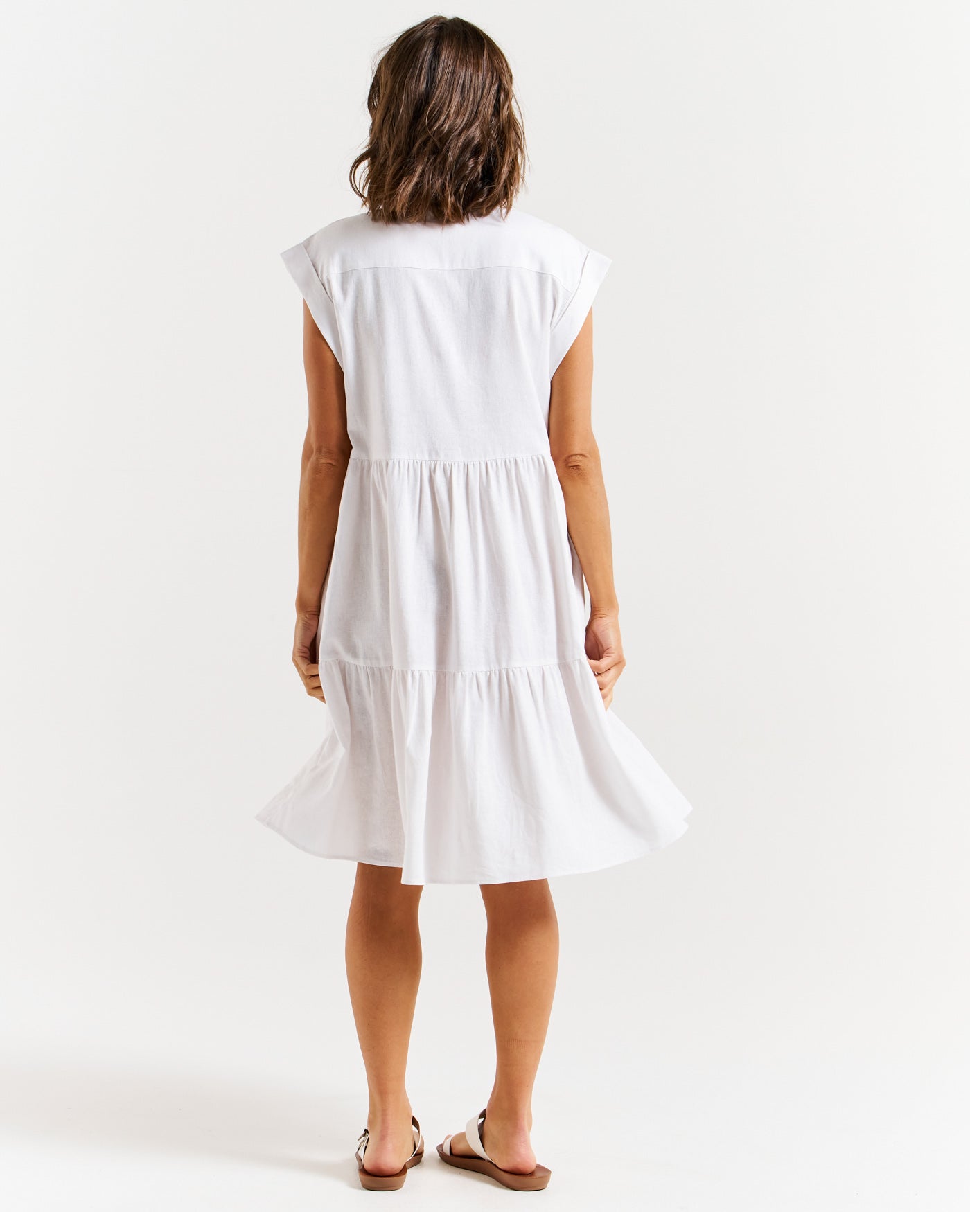 Back of women's Zurich tiered midi dress in white by Betty Basics.