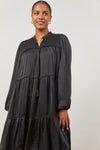 Romance Dress in Onyx with V-neck with tassel ruched detail with gathering across the front of shoulders, piped tiers and long sleeves. Looks silky and satiny.