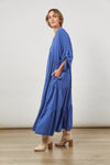 Maxi Length tiered Euphoria dress in blue with long sleeves with tabs