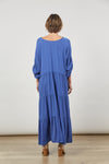 Back View of Azure Blue maxi tiered dress with long tabbed sleeves by Isle of Mine
