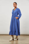 Slight Side View of the Euphoria Tie Maxi Dress in Azure Blue by Isle of Mine
