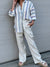 Little Lies Natural Eva Pleated Linen Pants in full length with button a zip closure.
