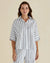 Woman wearing the betty basics Lynwood Linen Cotton Blend White Shirt with Elbow Length Sleeves, Classic collar and button up front.
