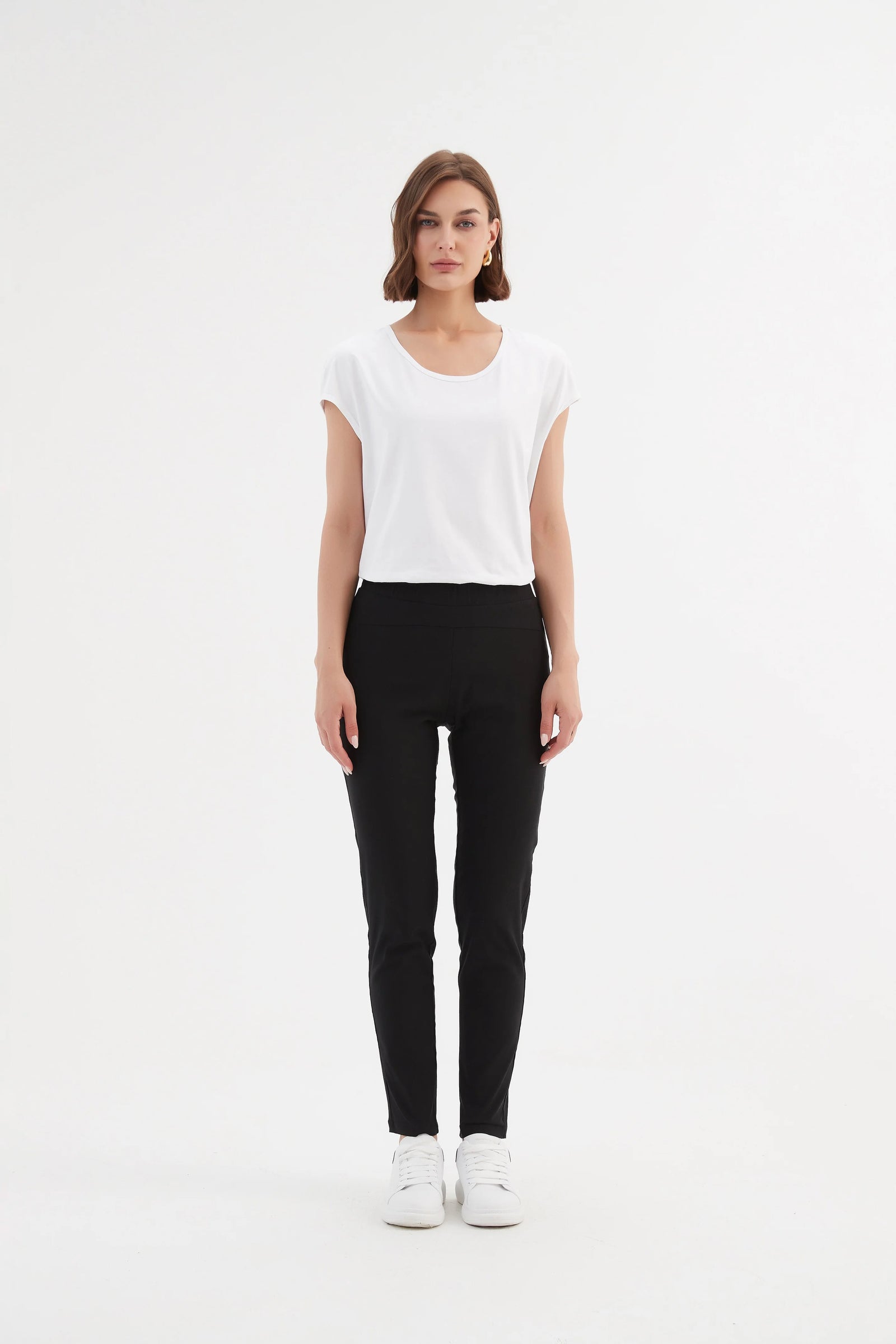 Women's straight leg black pants by Tirelli.
