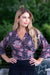 Women wearing the Allegra Silk Blend Wrap Top in Navy and Pink Paisley Floral by Cienna.