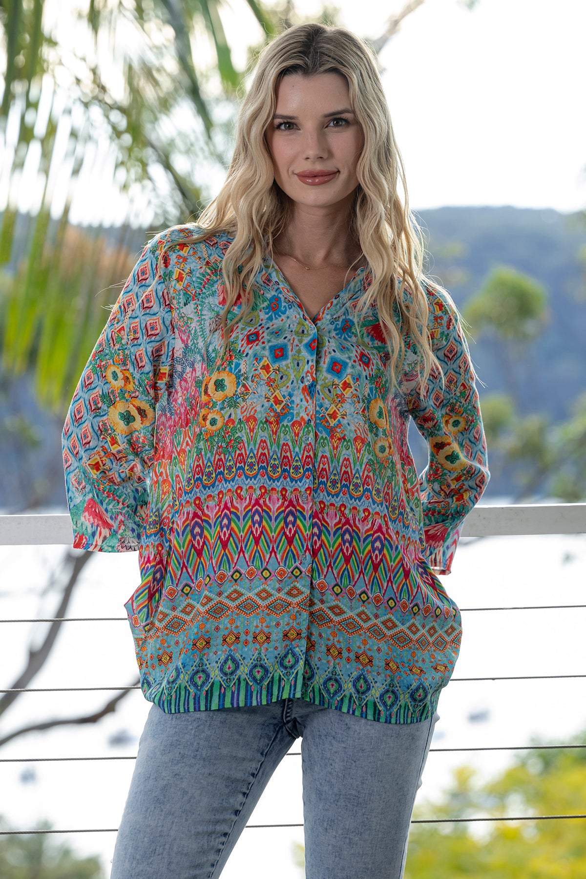 Model wearing Cienna&#39;s boho Carmen geometric multi shirt with long sleeves.