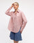 Woman wearing the Caddy Striped long sleeve Shirt in dusty pink and blue by White Closet.