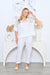 Lady wearing Cali&Co's Cotton Net Pocket Pants in White.
