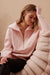Woman wearing ceres life Isabella Shell Pink Half Zip Sweat / Jumper.