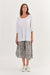 Ladies Namastai Pink Tuck Tunic Top in White.