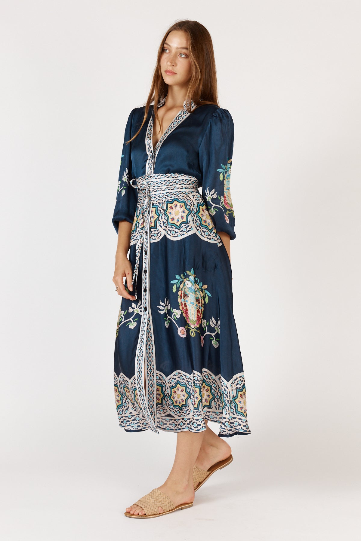 Woman wearing Garcia Midi Satin Dress with fun print and elbow length sleeves in navy blue.
