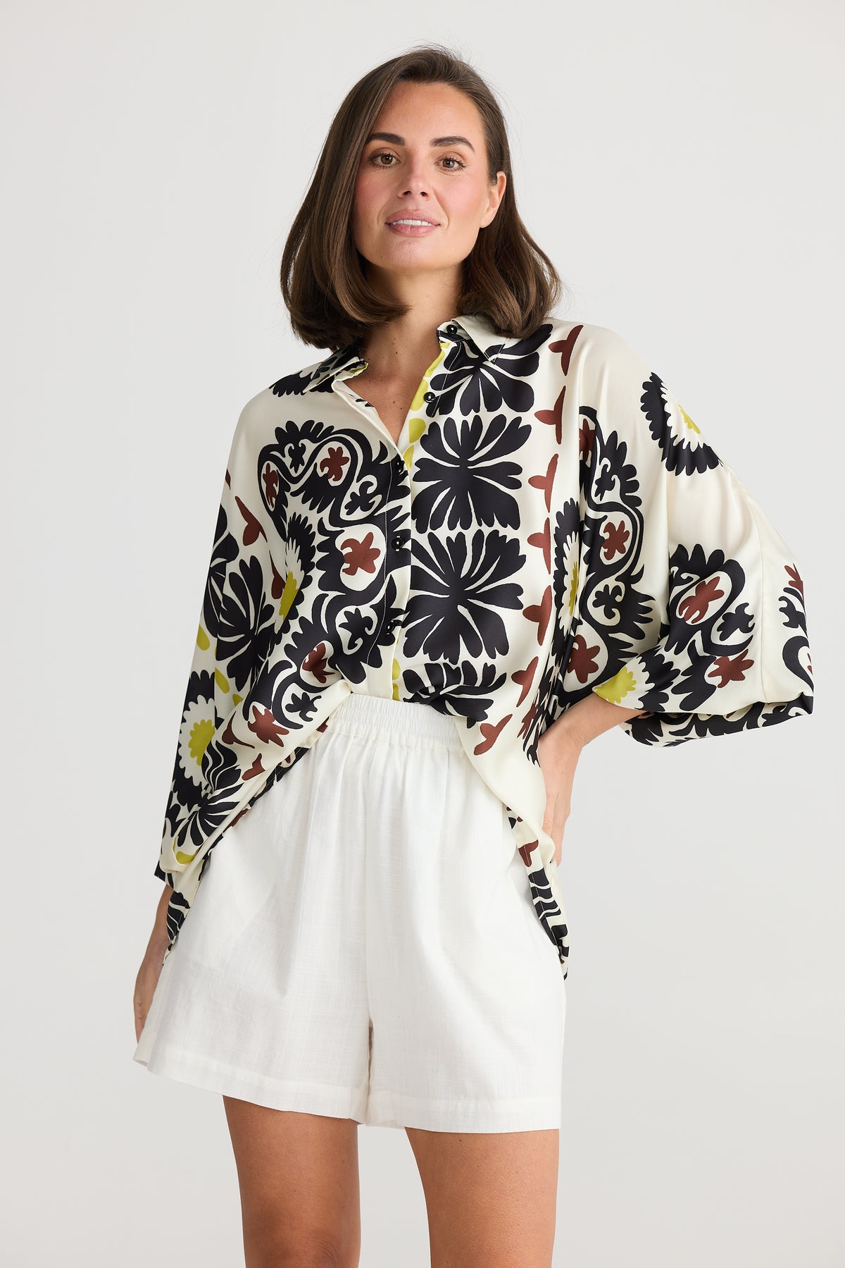 Black white brown and yellow print ladies oversized cliffside shirt.