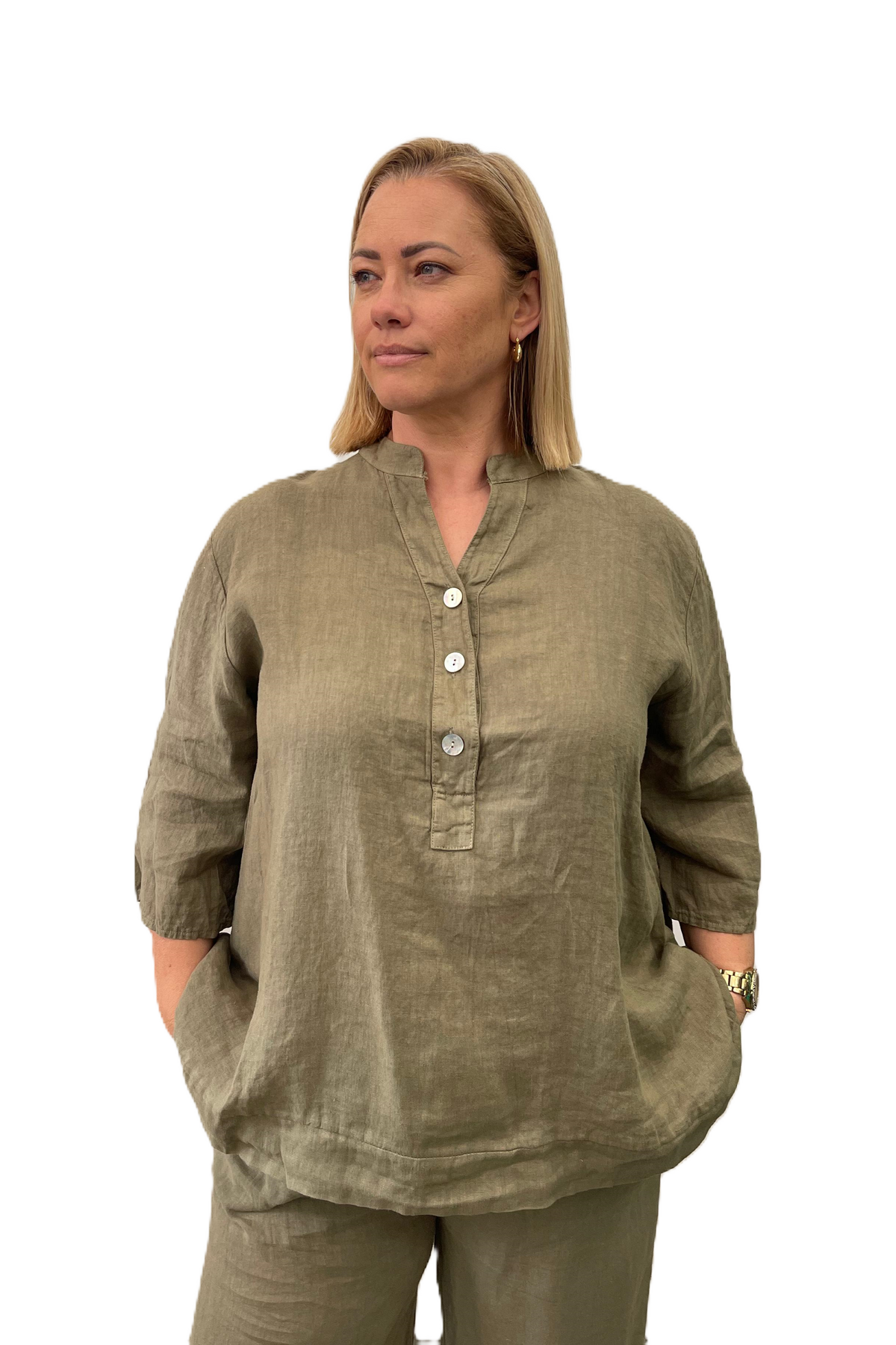 Kindred Spirit ladies wearing Slate Khaki Aversa top by The Italian Cartel.