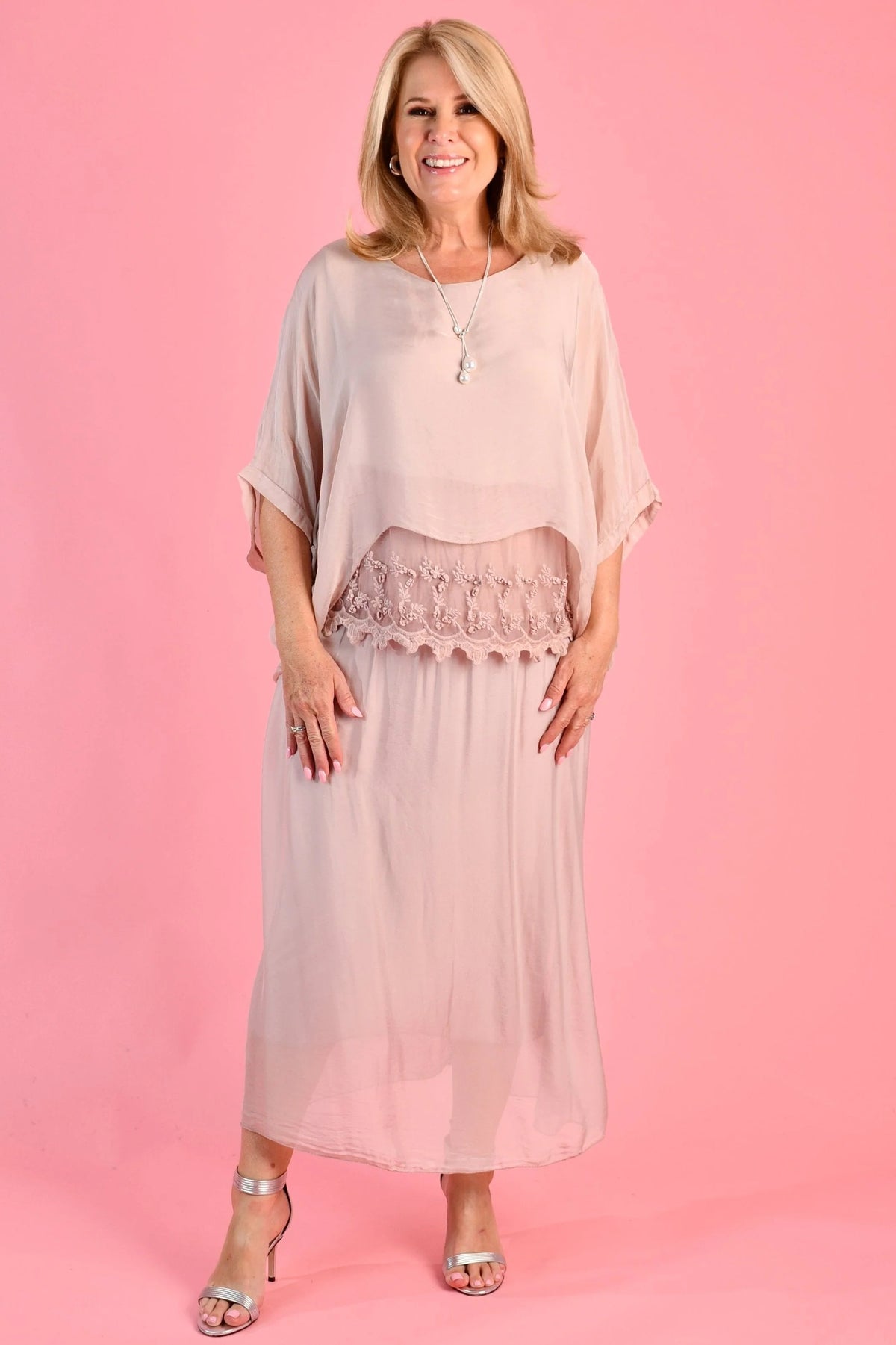Woman wearing the lined Marta Silk blend maxi skirt in light blush pink by La Sofia.