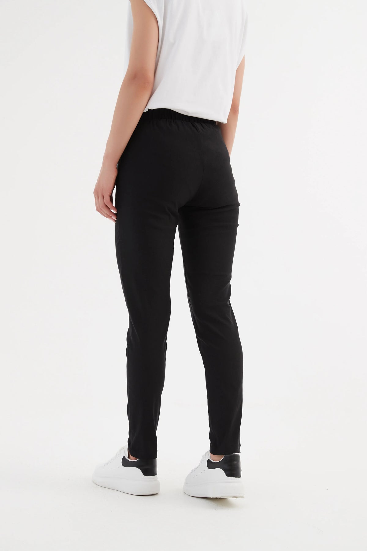 Ladies fitted straight leg trousers in black by Tirelli.