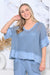Woman wearing Cotton Net Top with singlet / cami with short sleeves in denim blue by Cali&Co.