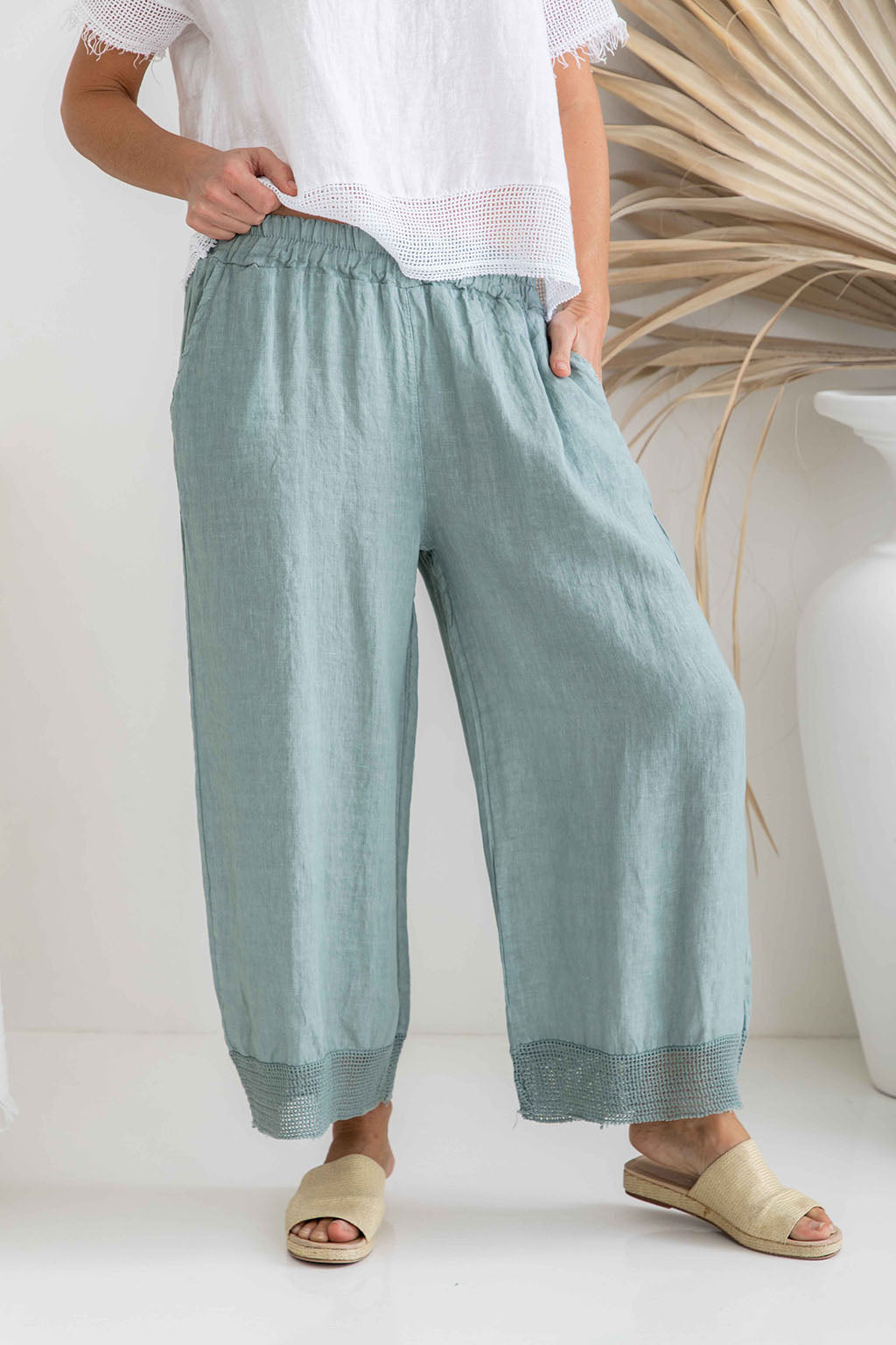 Ladies Pineta blue linen pants with open weave hem by The Italian Cartel.