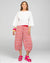 Lady wearing Boom Shankar's Cotton Cropped Guru Pants in Naples Pomodoro a fun red, white and pink print crop pant.