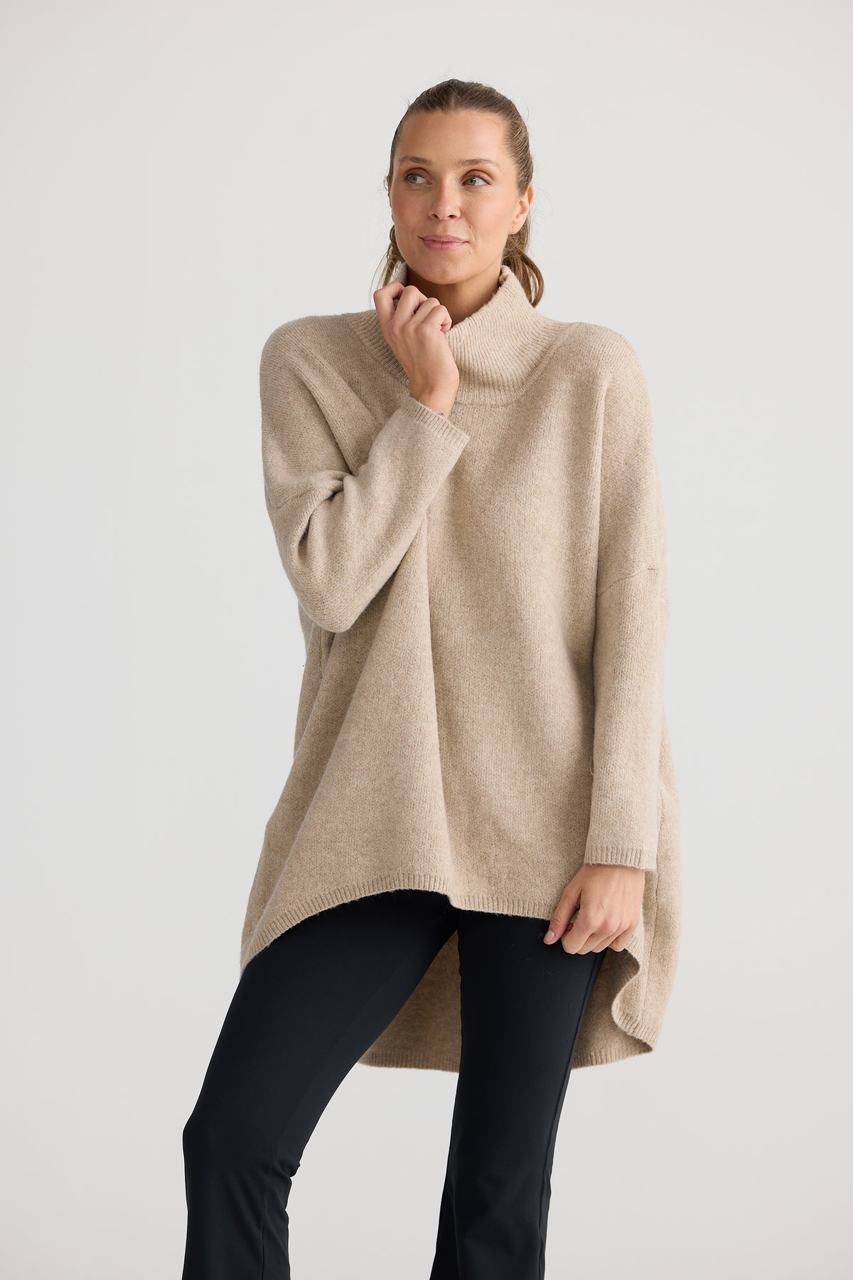 Ladies Natural knit Barossa poncho with sleeves by Holiday Life.
