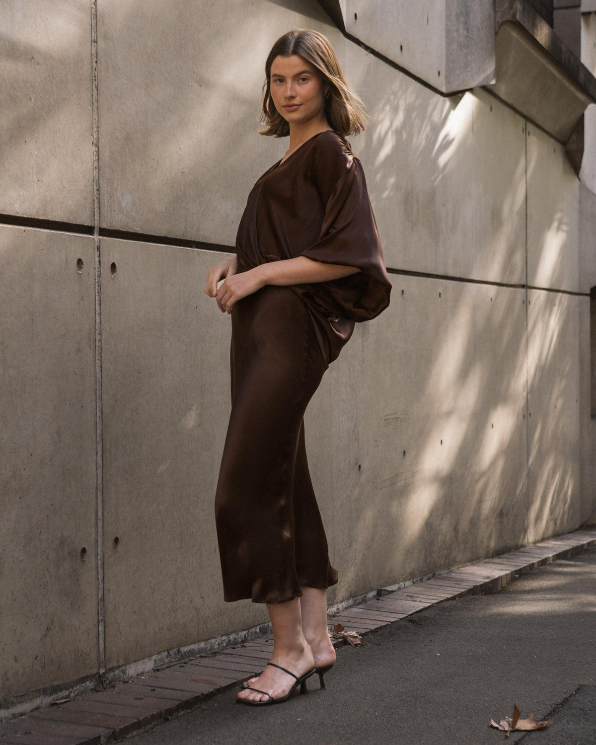 white closet chocolate brown nightfall satin midi skirt with elastic waist.