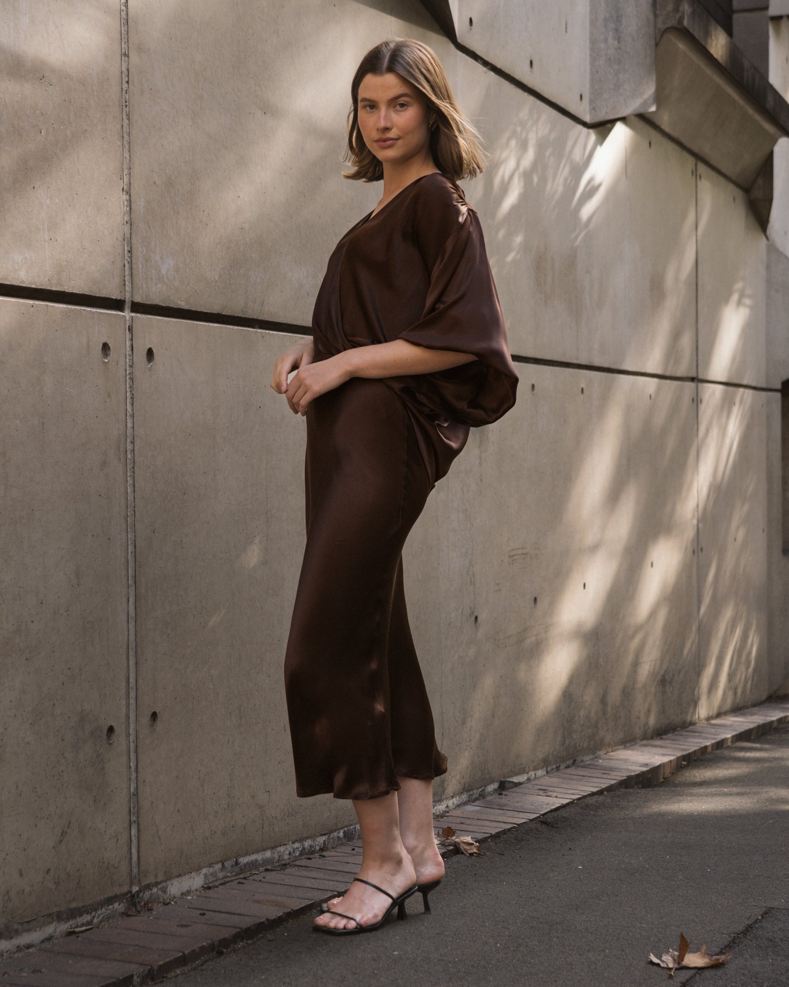 white closet chocolate brown nightfall satin midi skirt with elastic waist.