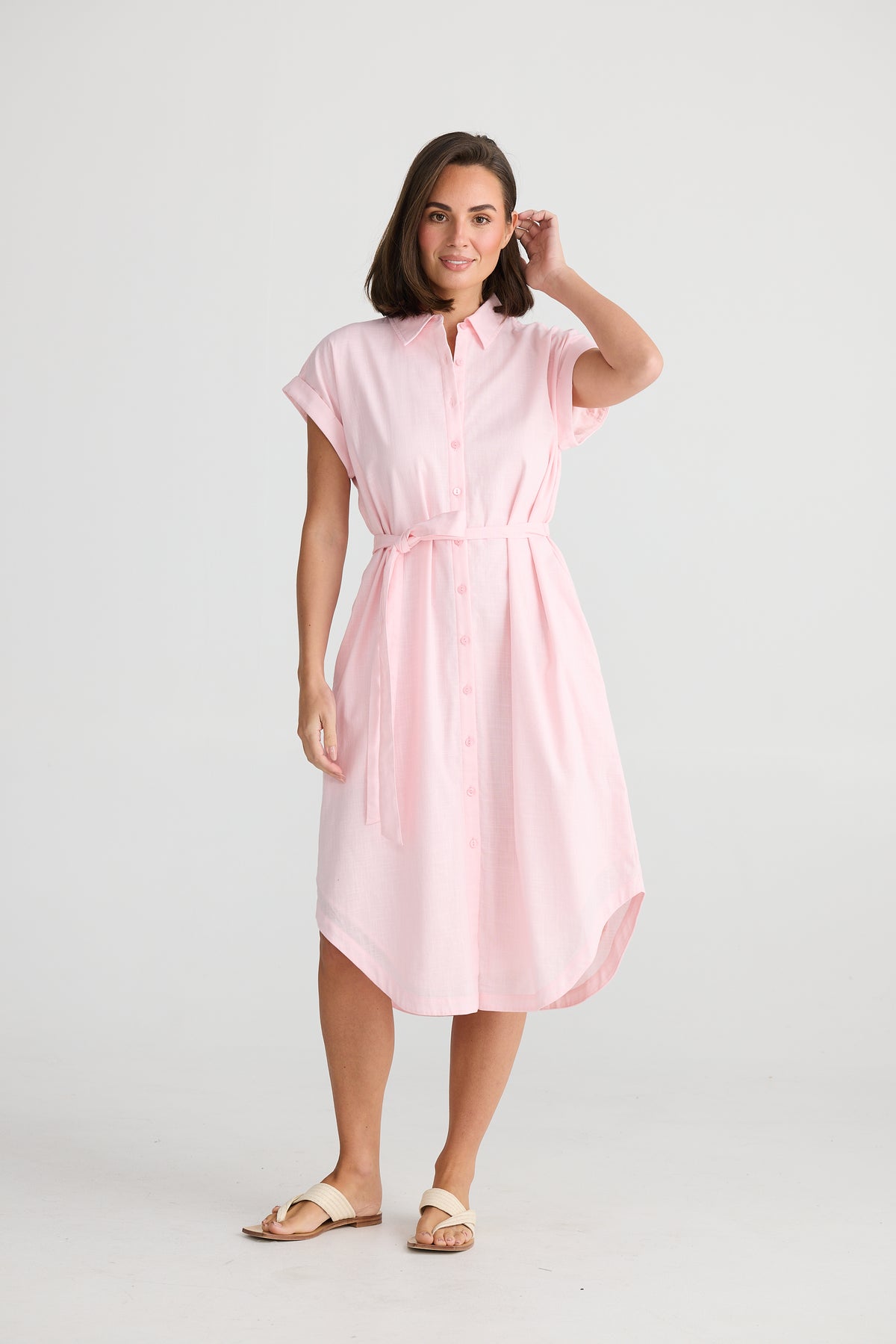 Ladies pink midi shirt dress with tie waist by Holiday Trading.