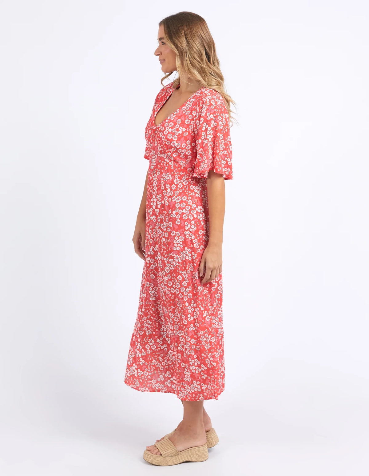 Side View of V-Neck, short sleeves on the Ankara floral dress in red by Foxwood.