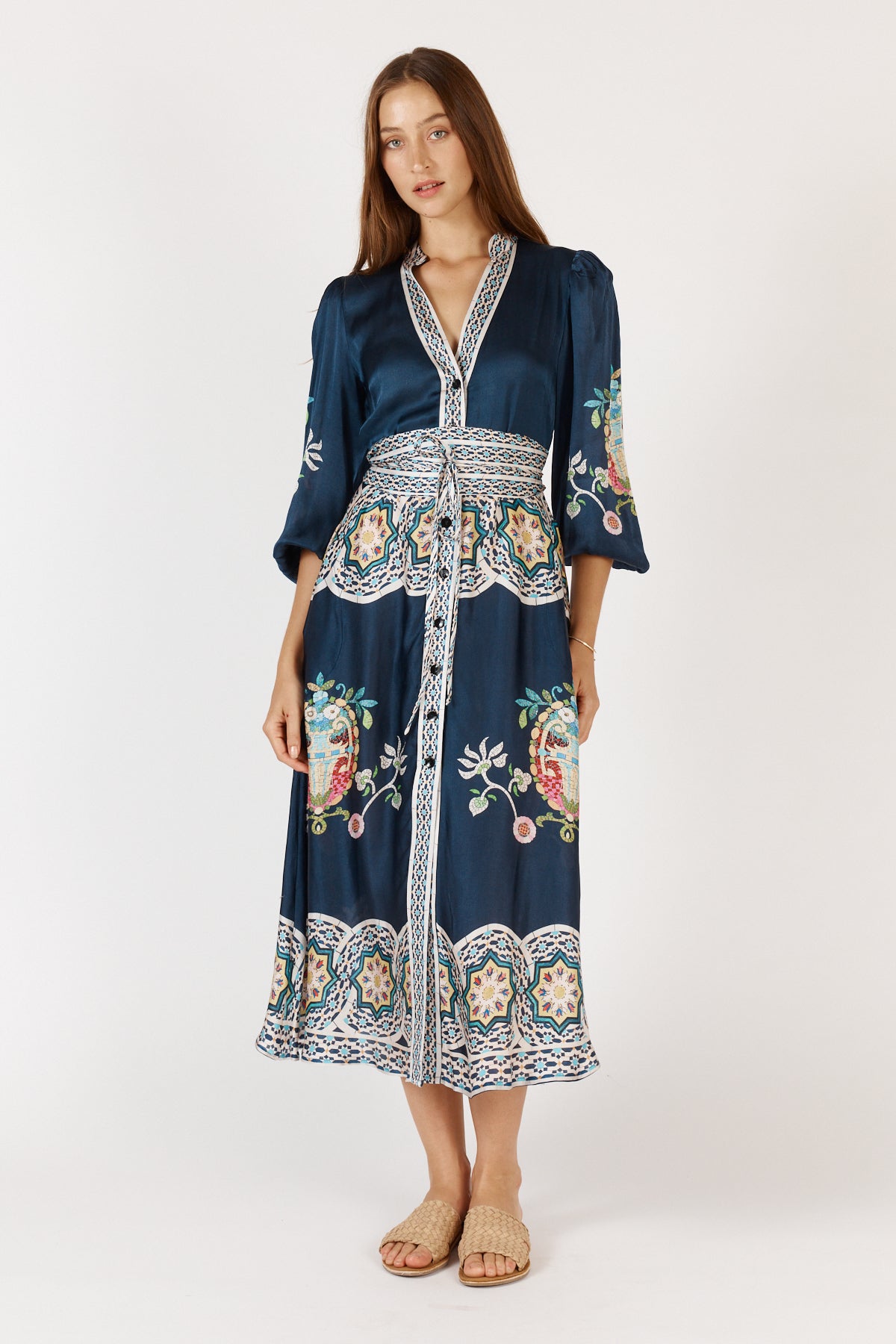 Woman wearing Garcia Midi Satin Dress with fun print and elbow length sleeves in navy blue.
