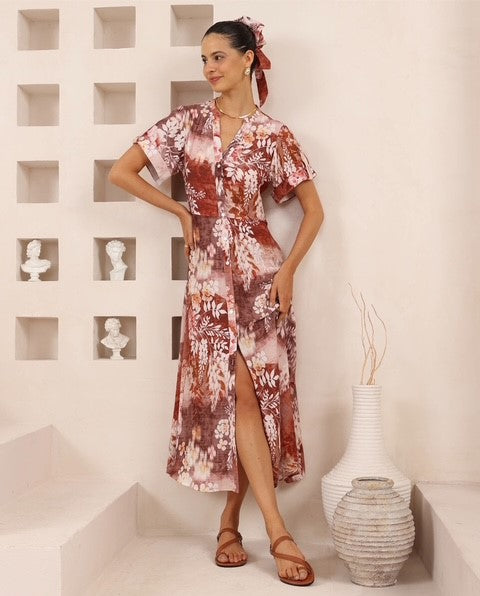 Woman wearing the leafy Rylee Tie Front or Back Dress with button up front, short sleeves, vneck and is oh so pretty from Iris Maxi.