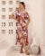 Woman wearing the leafy Rylee Tie Front or Back Dress with button up front, short sleeves, vneck and is oh so pretty from Iris Maxi.