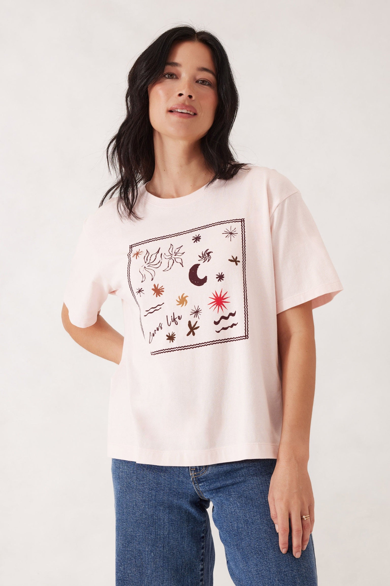 Woman wearing the relaxed fit Stevie Slouch Tshirt in shell pink with berry scarf print by Ceres Life.