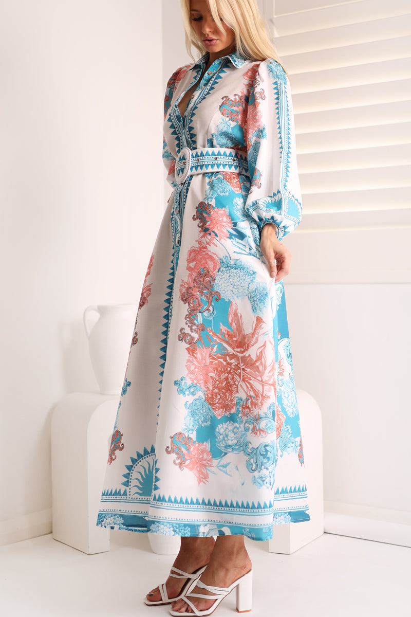 Lined Shirt Style Maxi Dress in Teal Floral Print with a fabric belt, button up front and pretty print by Ave the Label.