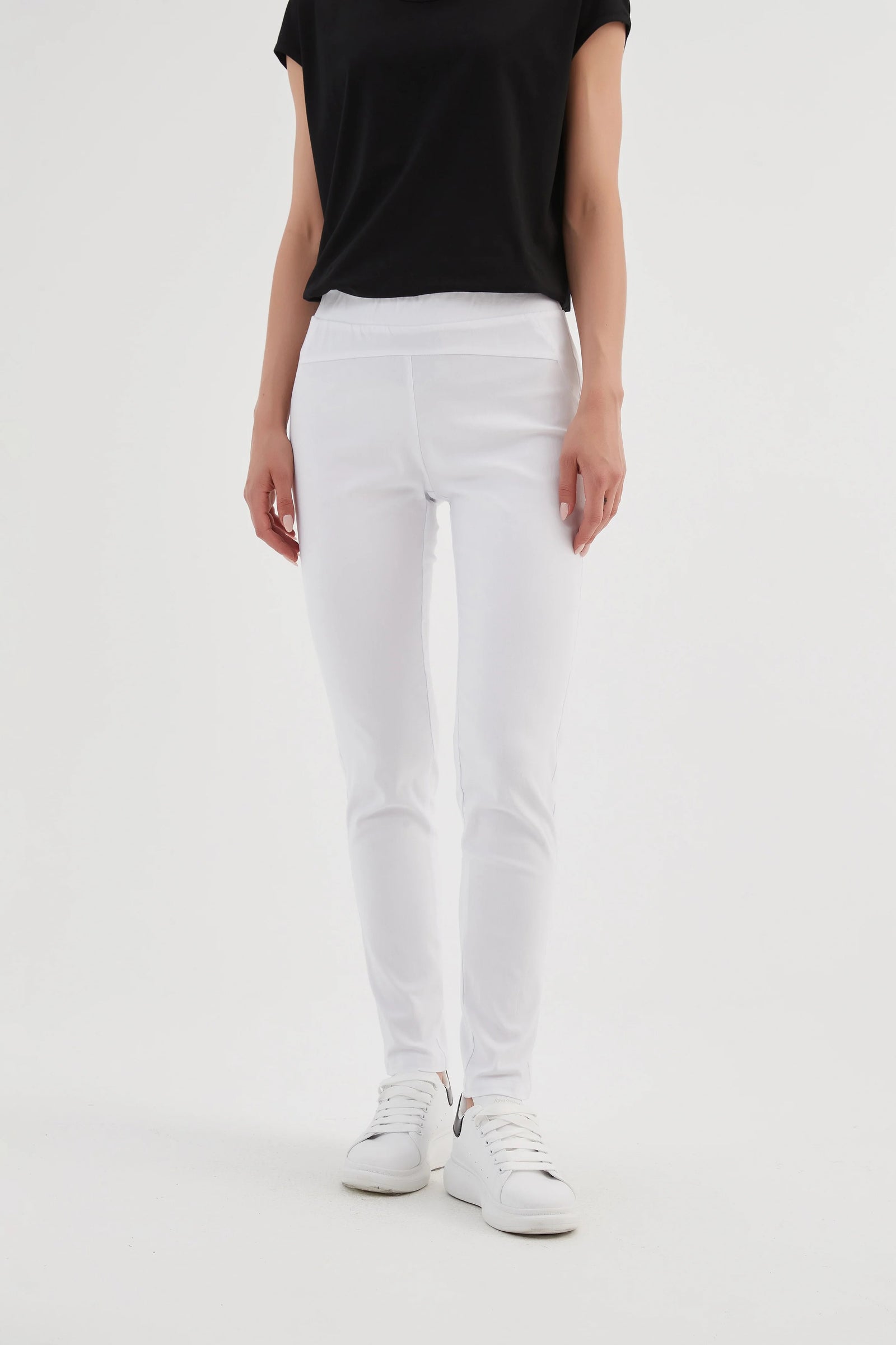 Women's fitted trousers in white with straight leg styling by Tirelli.