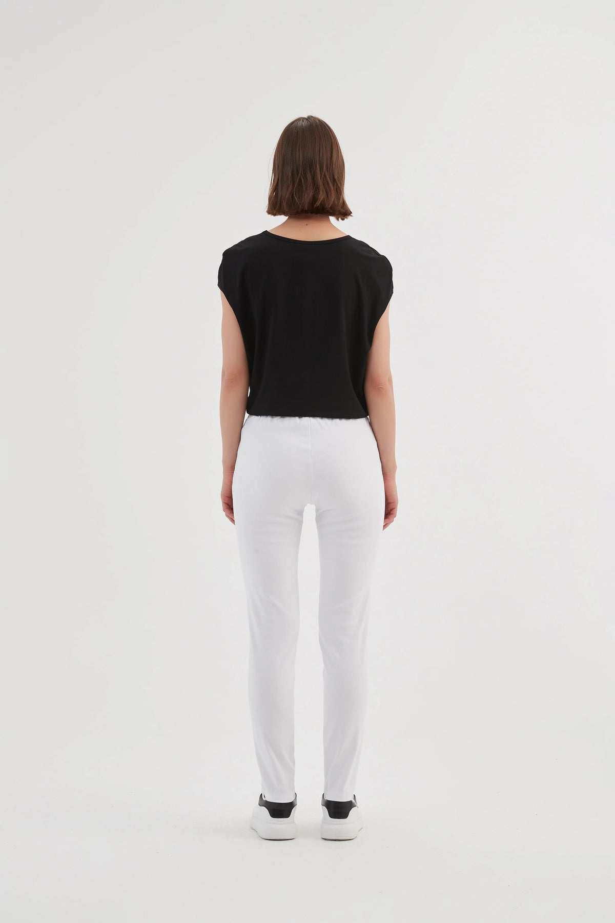 White ladies trousers in straight leg by Tirelli.