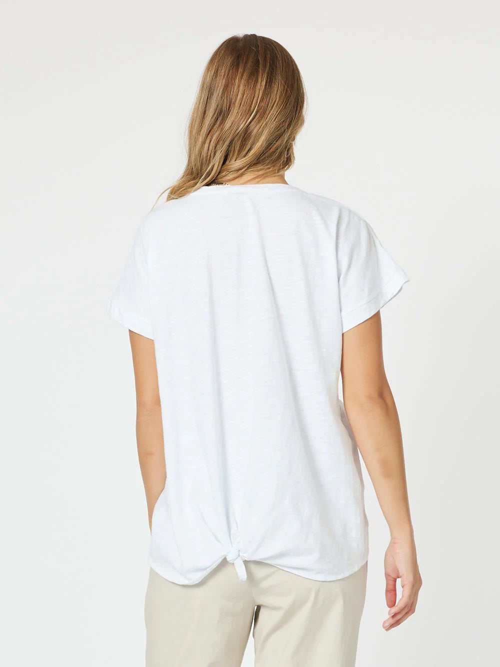 Back of Ladies white tshirt with short sleeves and curved back hem.