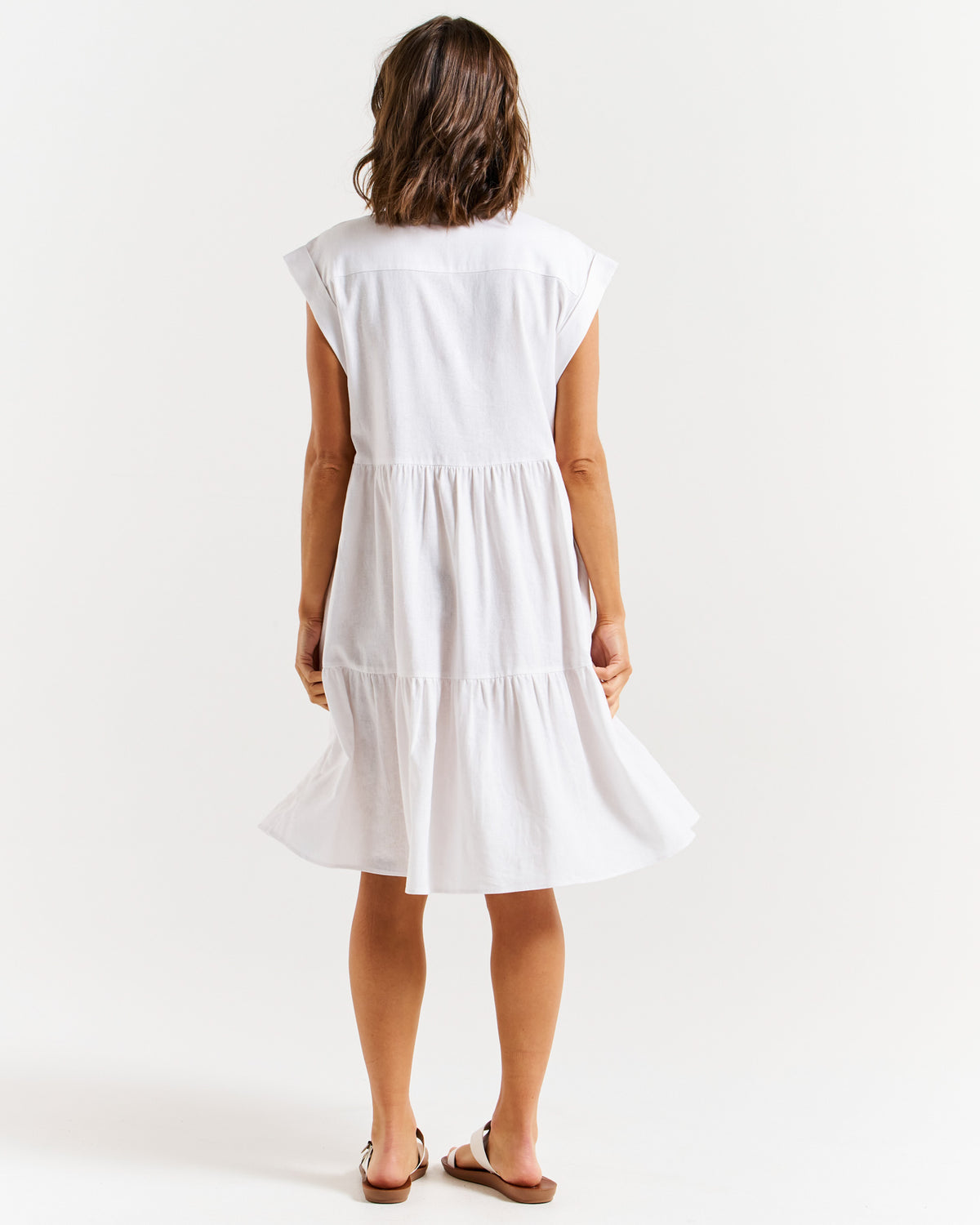 Back of women's Zurich tiered midi dress in white by Betty Basics.